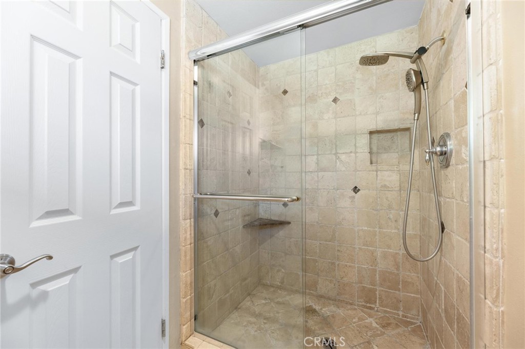 12110 Braemore Place Porter Ranch, CA 91326 - Photo 24 of 45 a bathroom with a shower