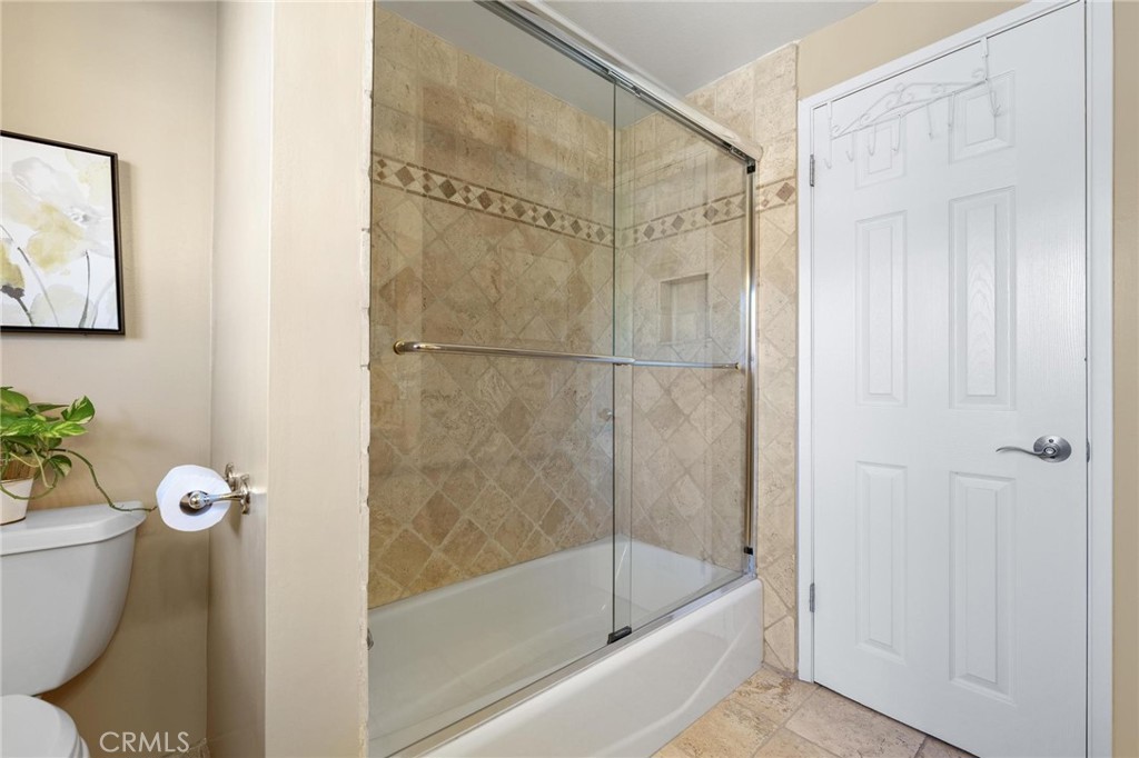 12110 Braemore Place Porter Ranch, CA 91326 - Photo 30 of 45 a bathroom with a shower and a toilet