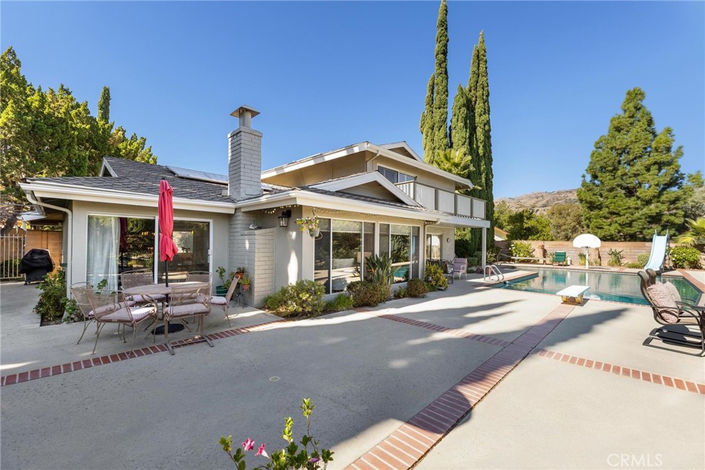12110 Braemore Place Porter Ranch, CA 91326 - Photo 32 of 45 a front view of a house with sitting area