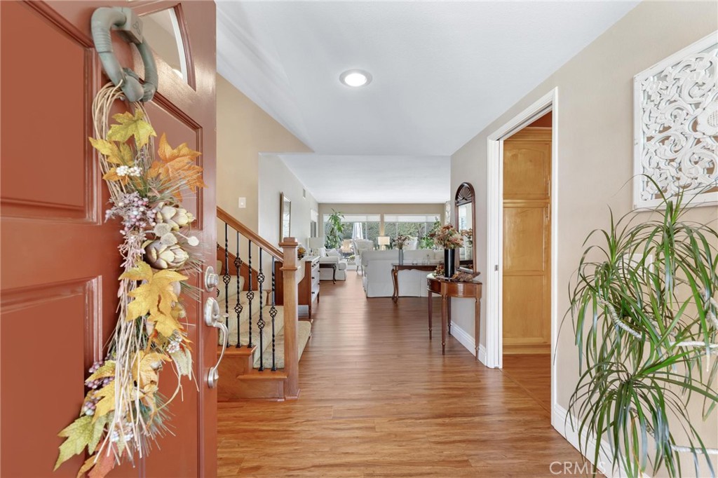 12110 Braemore Place Porter Ranch, CA 91326 - Photo 4 of 45 a view of a living room and dining room