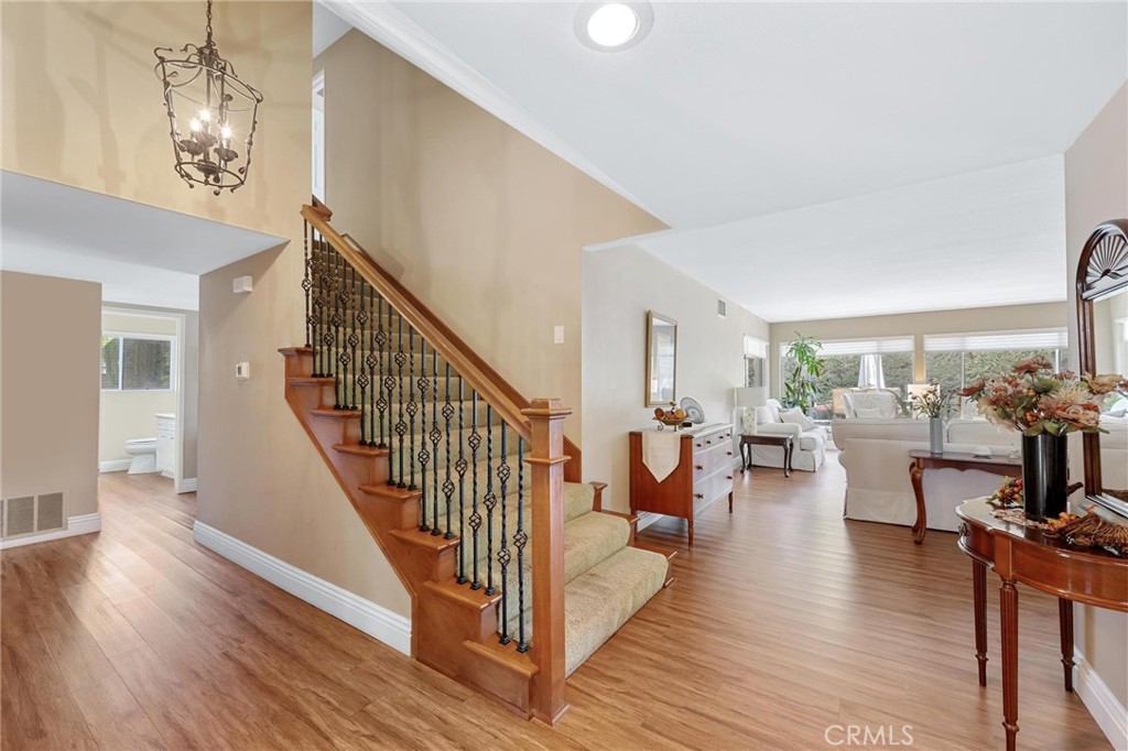 12110 Braemore Place Porter Ranch, CA 91326 - Photo 5 of 45 a view of a living room and dining room