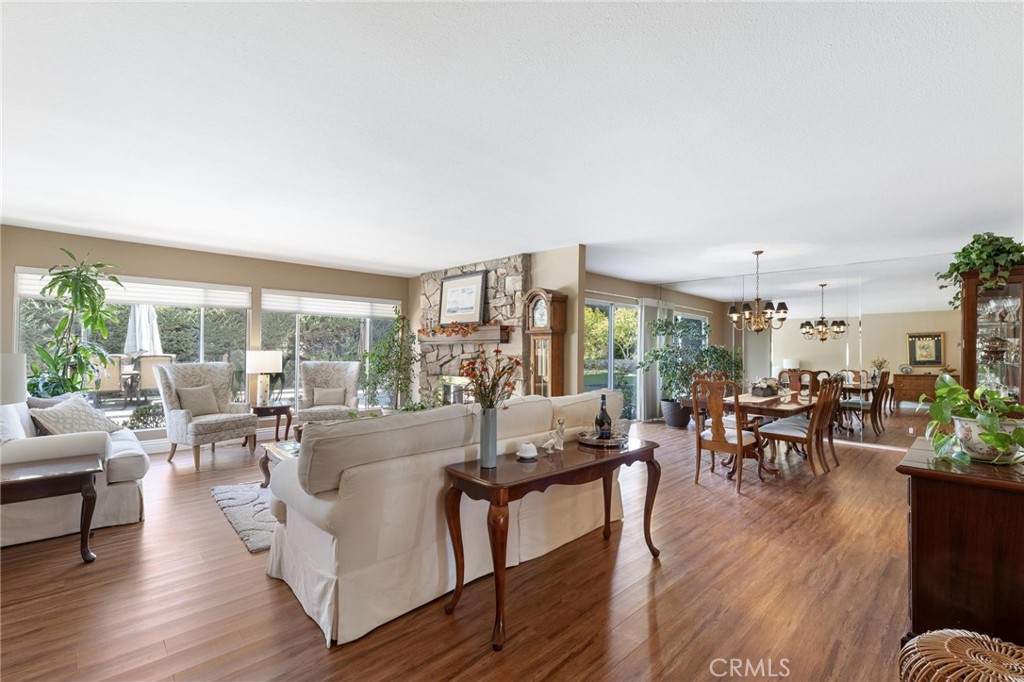 12110 Braemore Place Porter Ranch, CA 91326 - Photo 7 of 45 a living room with furniture and a large window