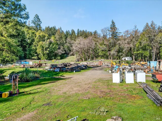 a view of outdoor space with deck and yard