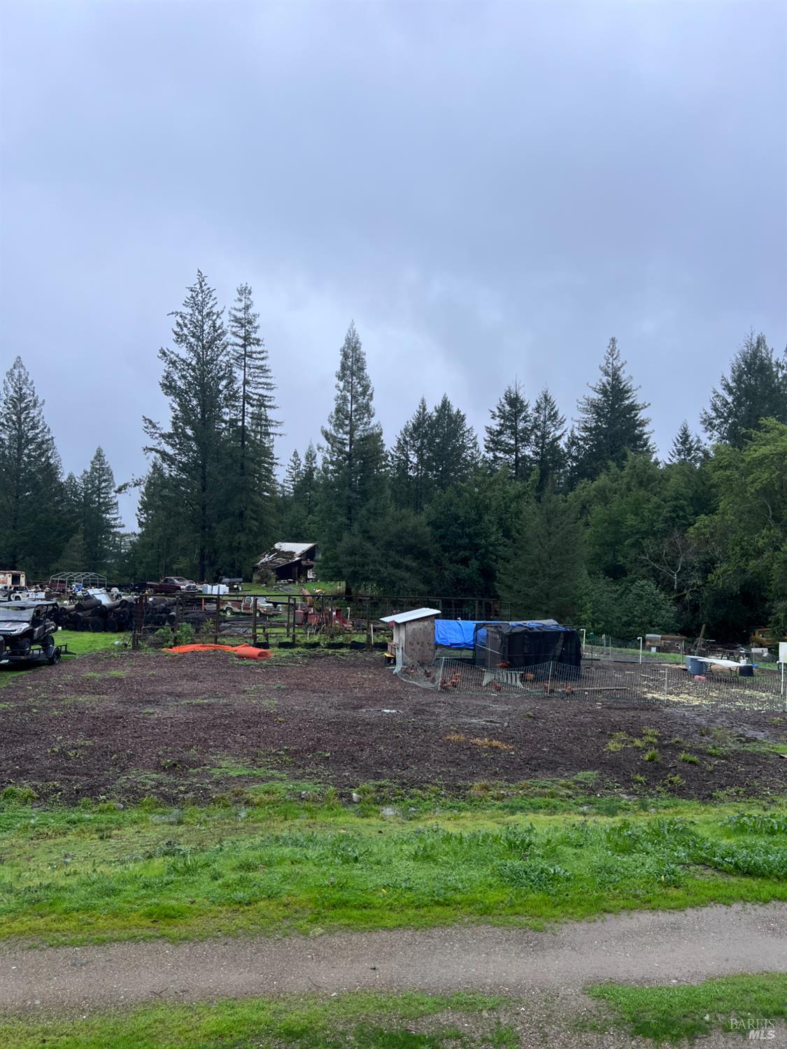 15785 Pole Mountain Road Cazadero, CA 95421 - Photo 3 of 44 a view of outdoor space with deck and yard