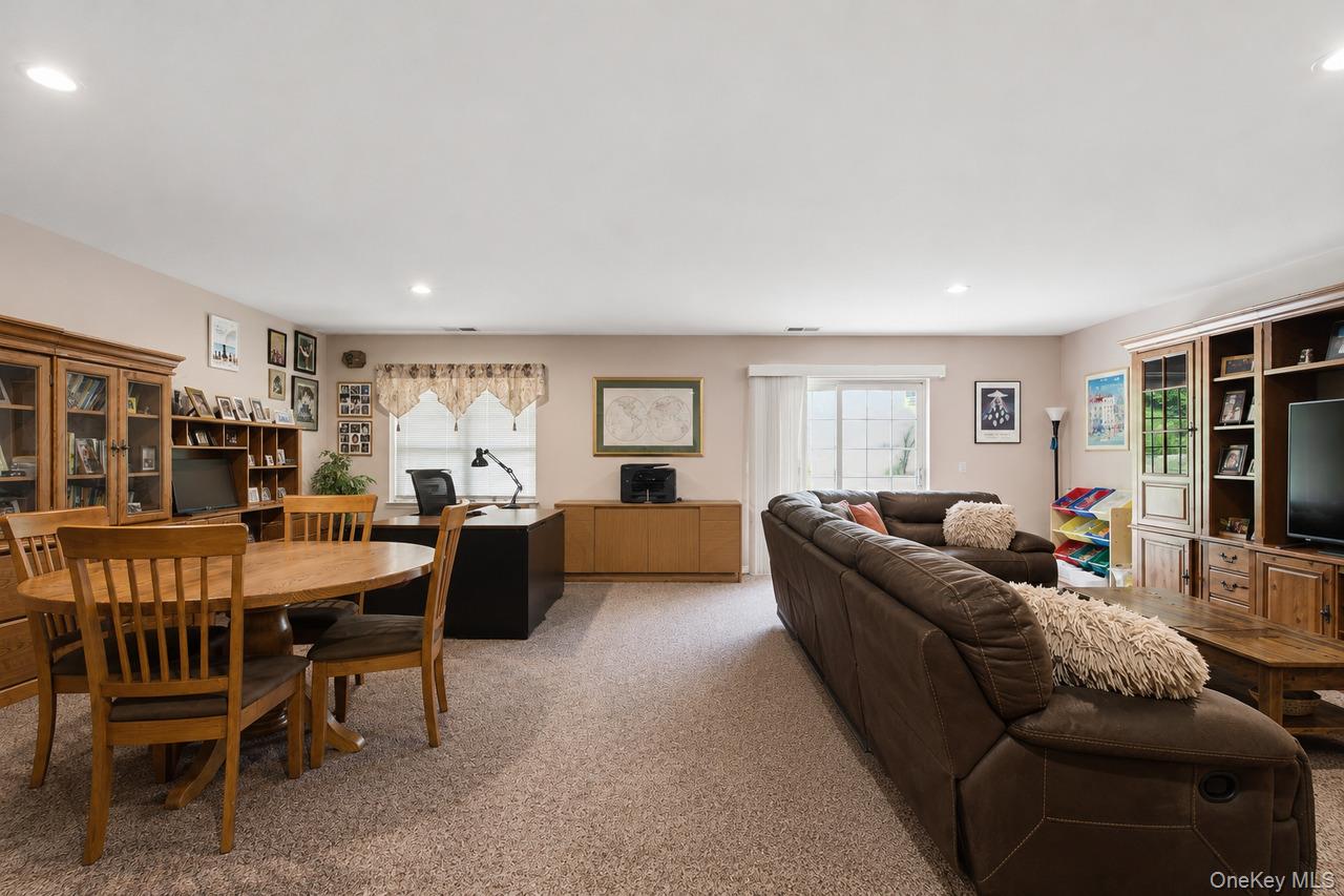 64 Roma Orchard Road Peekskill, NY 10566 - Photo 30 of 40 Open-concept room featuring neutral carpeting and recessed lighting