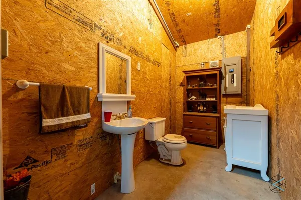 a bathroom with a sink and a toilet
