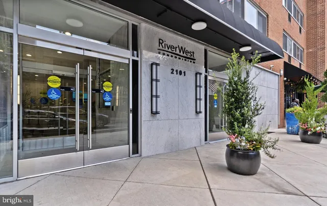 a view of water heater room with blue walls