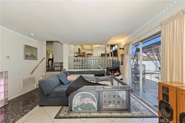 a living room with furniture and a table