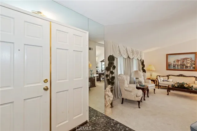 a view of a livingroom with furniture and a livingroom