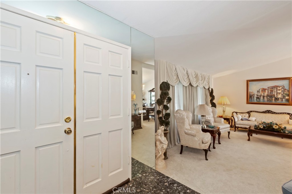 7055 Mango Street Rancho Cucamonga, CA 91701 - Photo 7 of 32 a view of a livingroom with furniture and a livingroom