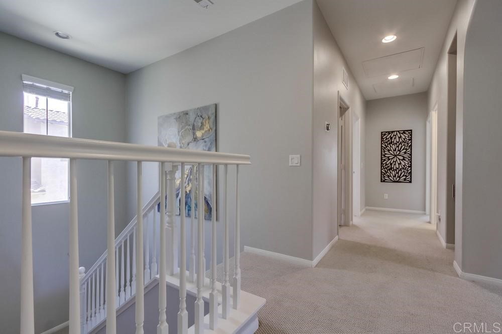 3400 Filoli Circle Carlsbad, CA 92009 - Photo 20 of 42 a view of hallway with stairs