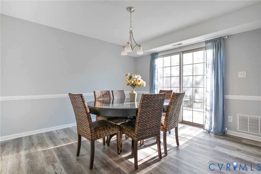 34 Brandywine Court Colonial Heights, VA 23834 - Photo 12 of 30 a view of a dining room with furniture window and wooden floor