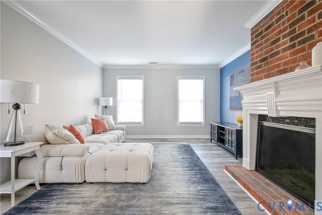 34 Brandywine Court Colonial Heights, VA 23834 - Photo 5 of 30 a large bedroom with a bed and a fireplace