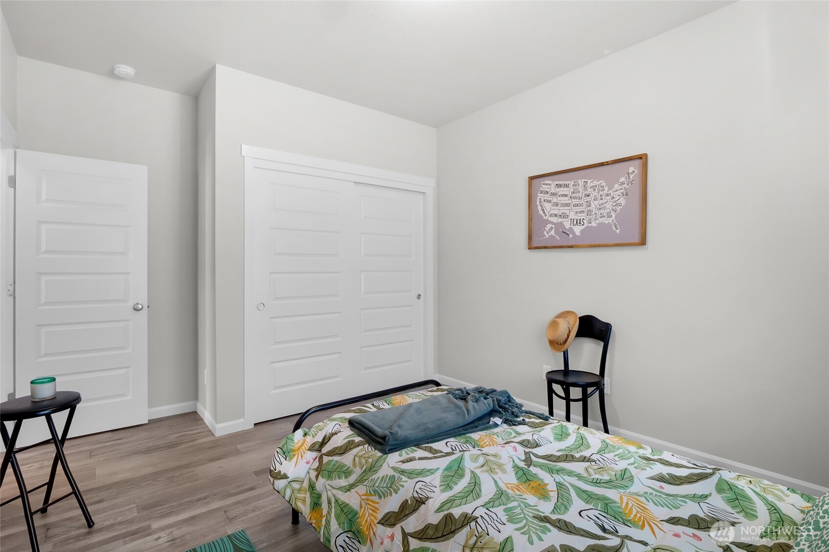 4705 West Merlin Street Moses Lake, WA 98837 - Photo 29 of 33 a bedroom with a bed and a closet
