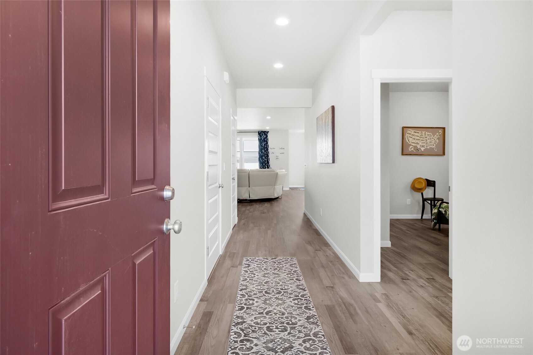 4705 West Merlin Street Moses Lake, WA 98837 - Photo 5 of 33 a view of hallway with wooden floor