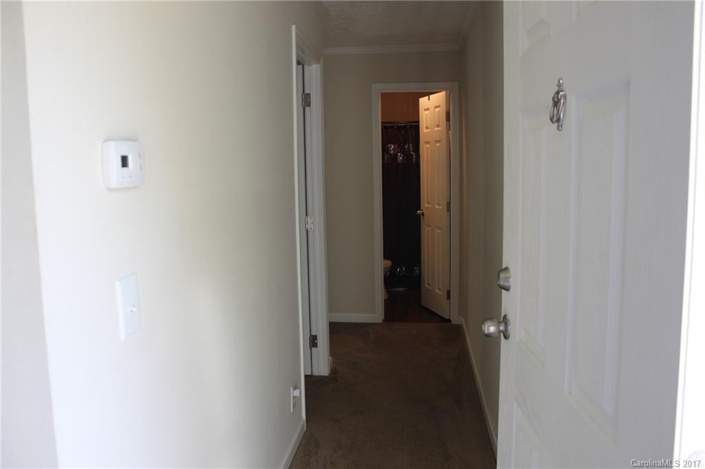 421 Cleghorn Mill Road, Unit 30 Rutherfordton, NC 28139 - Photo 8 of 23 a view of a livingroom from a hallway