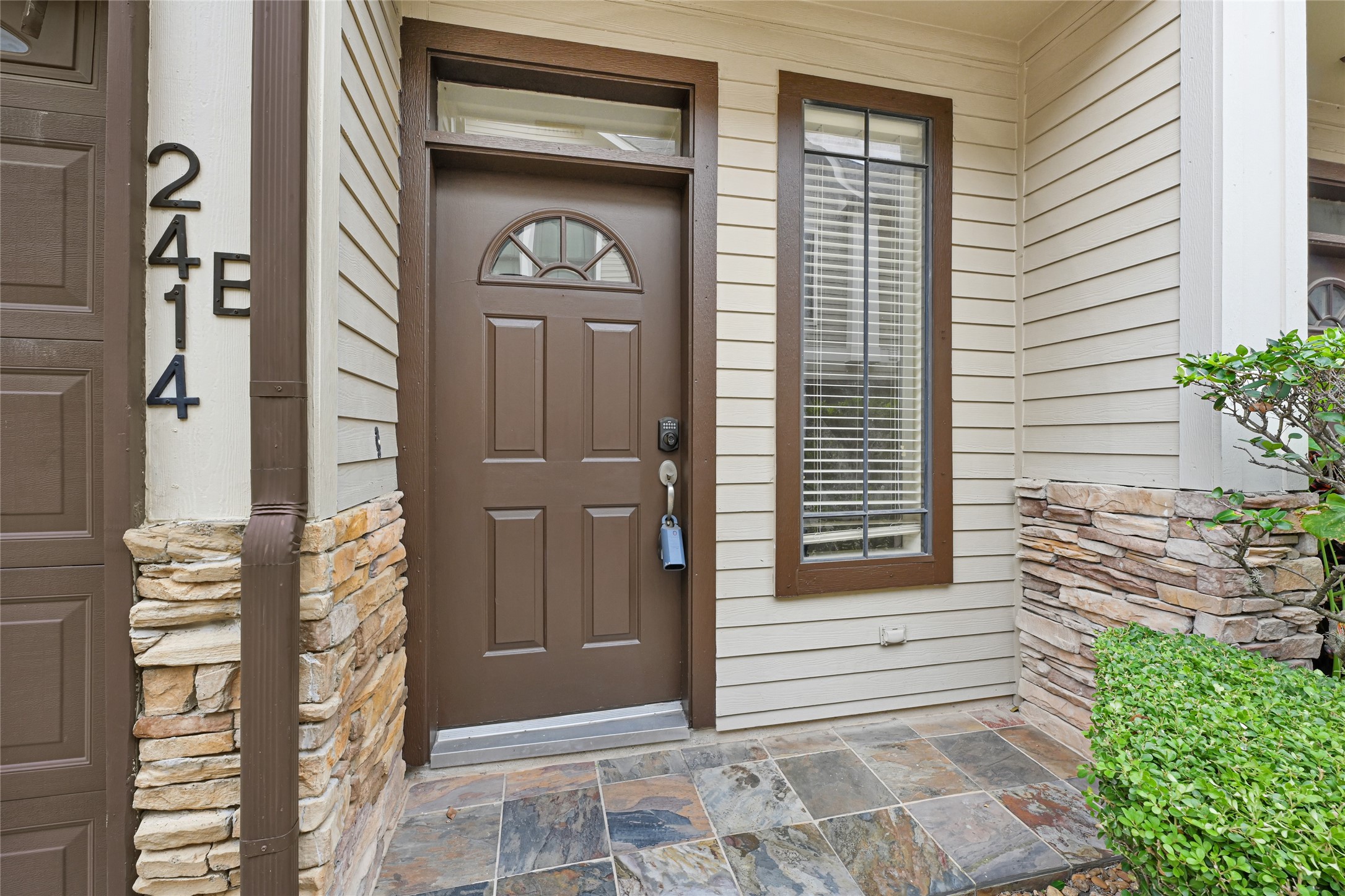 2414 Calumet Street, Unit B Houston, TX 77004 - Photo 3 of 27 a front view of a house with a garage