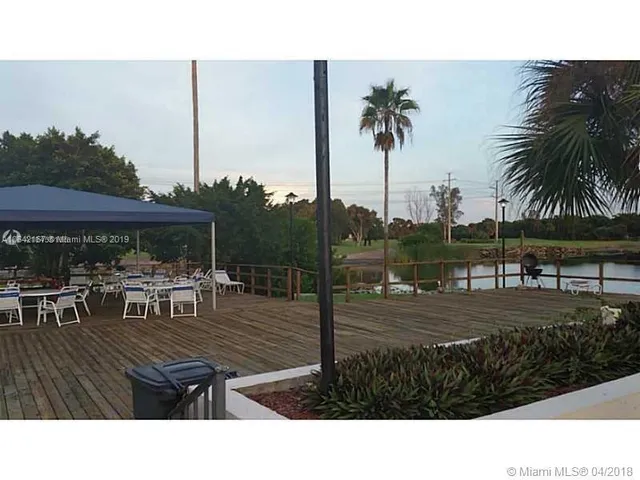 a view of a table and chairs in patio