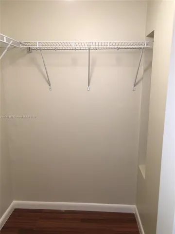 a view of small space with racks on the wall