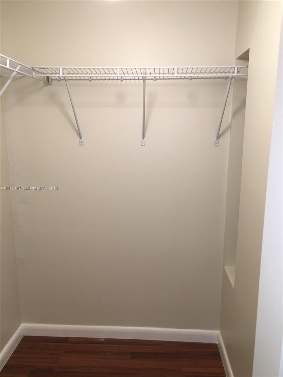 4164 Inverrary Drive, Unit 813 Lauderhill, FL 33319 - Photo 11 of 25 a view of small space with racks on the wall