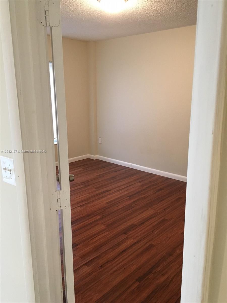 4164 Inverrary Drive, Unit 813 Lauderhill, FL 33319 - Photo 19 of 25 a view of wooden floor