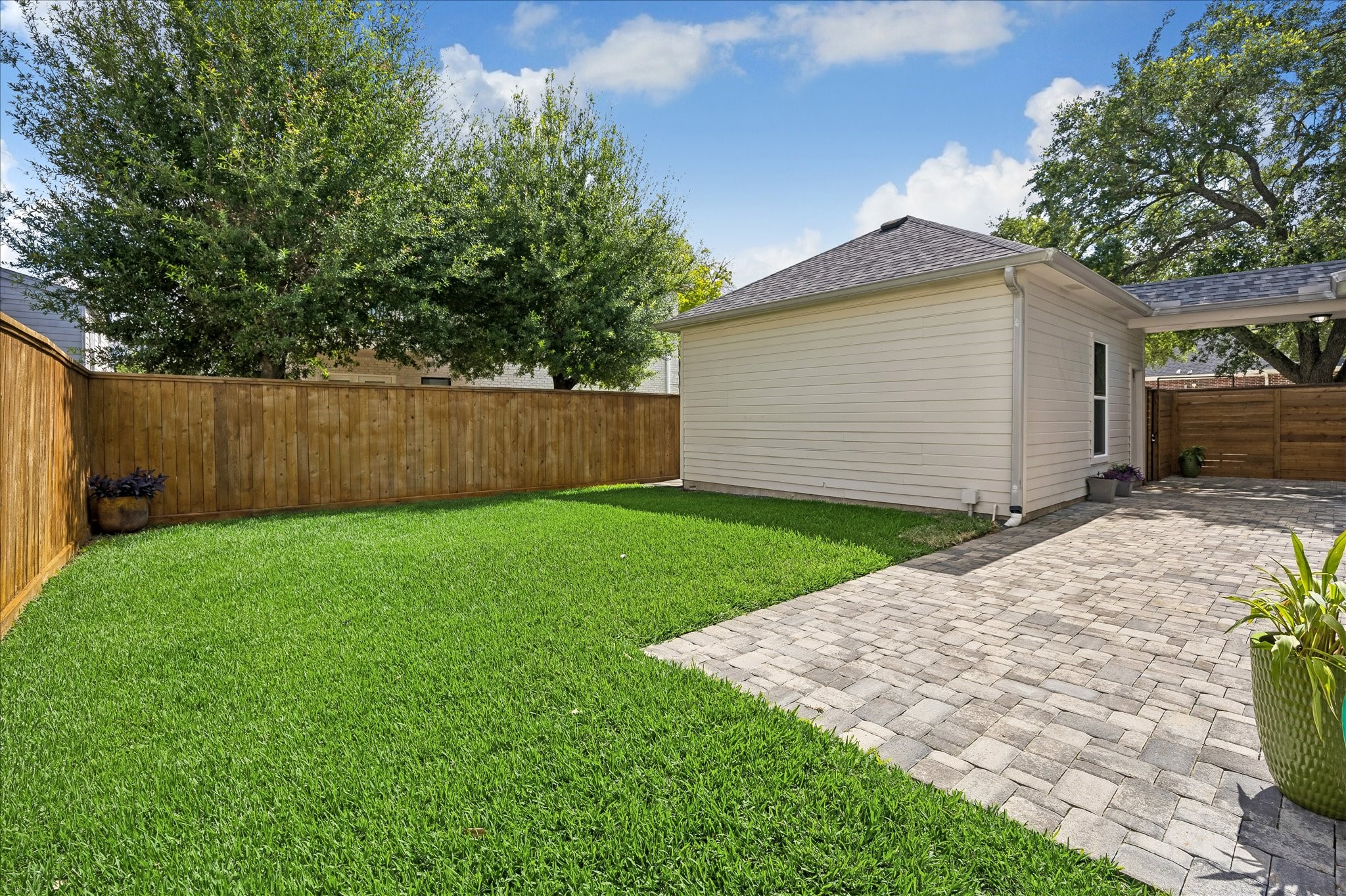 4131 Sunset Boulevard Houston, TX 77005 - Photo 32 of 38 a view of a backyard with a garden
