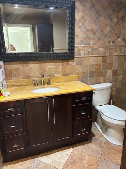 2201 Brickell Avenue, Unit 84 Miami, FL 33129 - Photo 3 of 7 a bathroom with a sink and a toilet