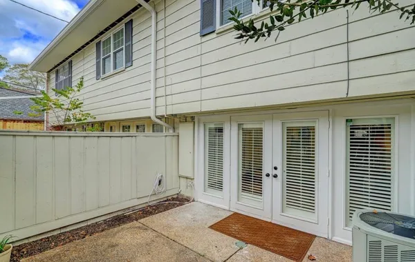 a view of a porch with a door