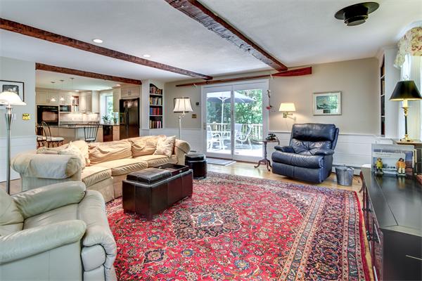 429 Linebrook Road Ipswich, MA 01938 - Photo 13 of 30 a living room with furniture and a fireplace