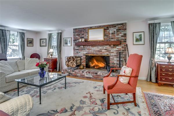429 Linebrook Road Ipswich, MA 01938 - Photo 5 of 30 a living room with furniture and a fireplace