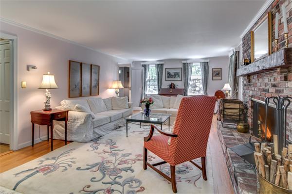 429 Linebrook Road Ipswich, MA 01938 - Photo 6 of 30 a living room with furniture a fireplace and a large window