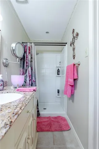 a view of a porch with furniture and a yard