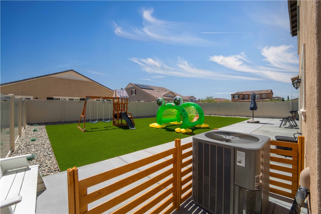 4422 Jade Court Lancaster, CA 93536 - Photo 12 of 44 a view of a terrace with a garden