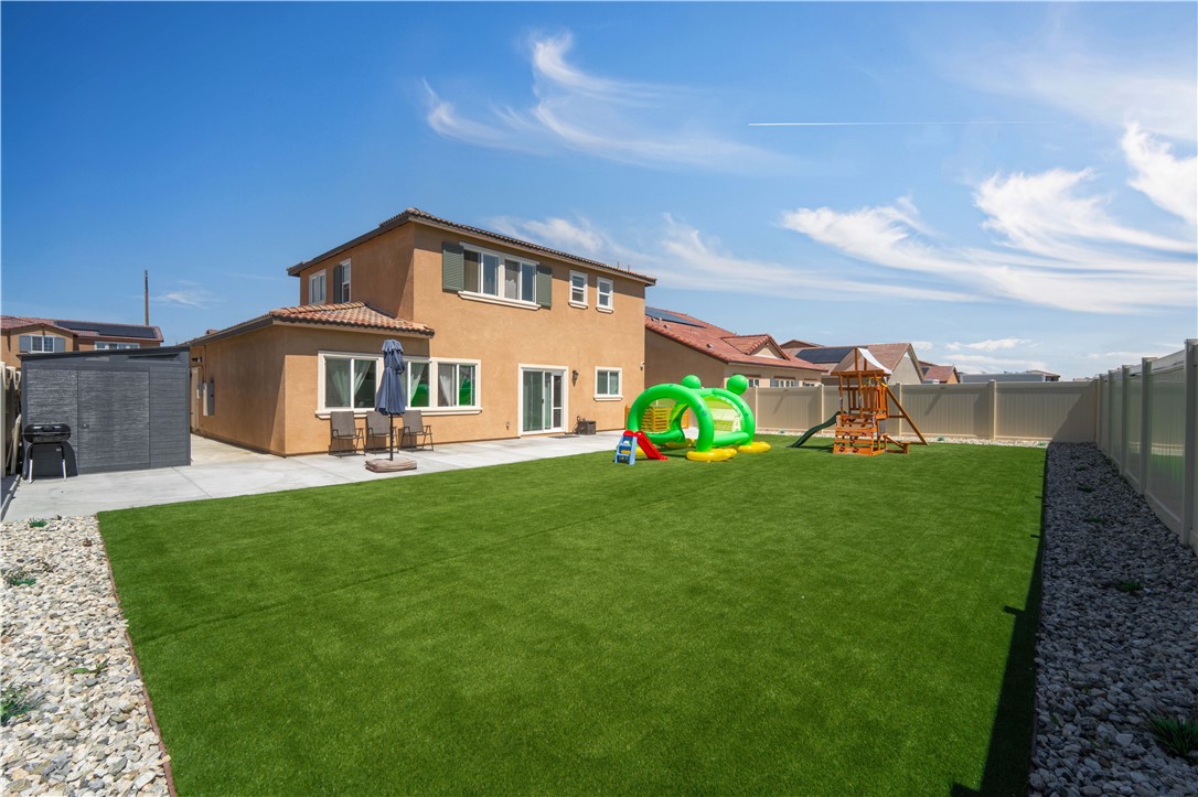 4422 Jade Court Lancaster, CA 93536 - Photo 16 of 44 a front view of a house with garden
