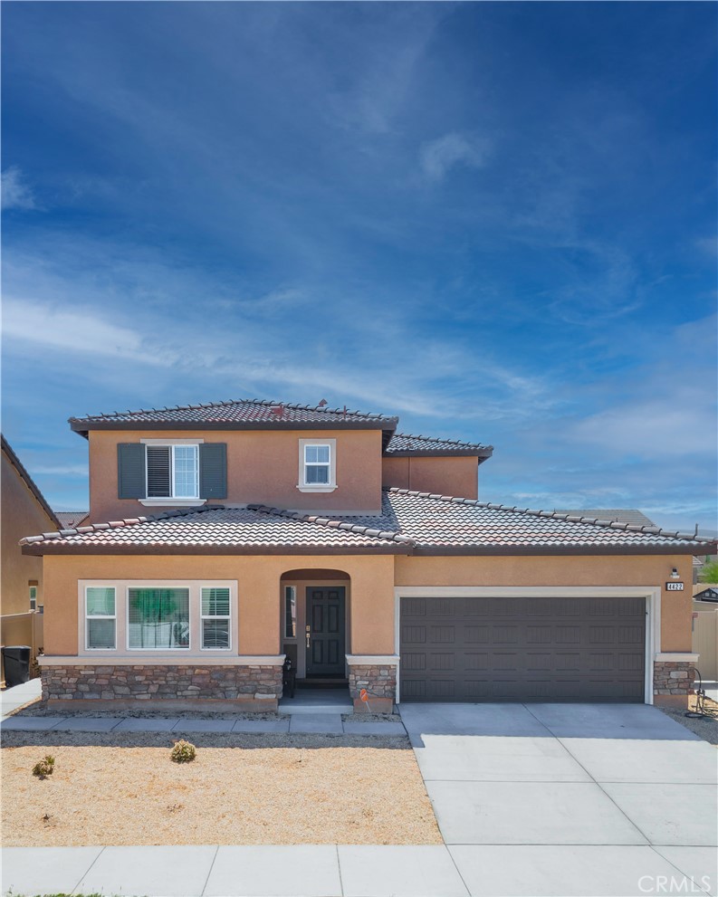 4422 Jade Court Lancaster, CA 93536 - Photo 2 of 44 a front view of a house with yard