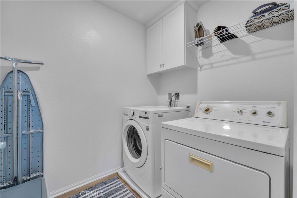 4422 Jade Court Lancaster, CA 93536 - Photo 32 of 44 a utility room with dryer and washer