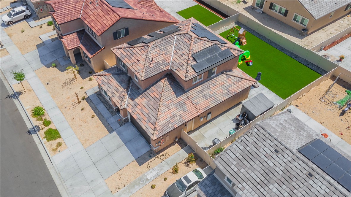 4422 Jade Court Lancaster, CA 93536 - Photo 4 of 44 an aerial view of a house with a garden