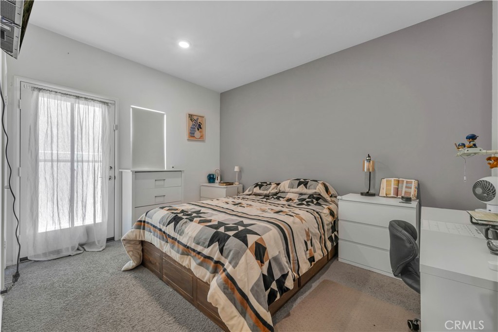 4422 Jade Court Lancaster, CA 93536 - Photo 44 of 44 a bedroom with a bed and a window