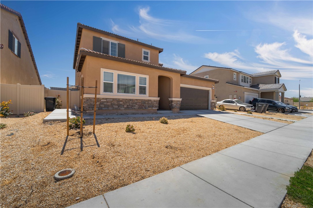 4422 Jade Court Lancaster, CA 93536 - Photo 9 of 44 a house view with a outdoor space