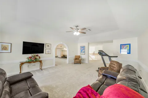 a view of a living room with a fireplace