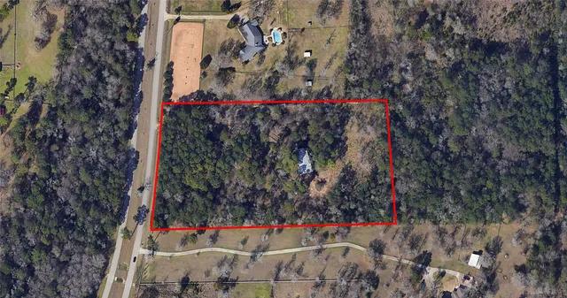 a view of a garden from a balcony