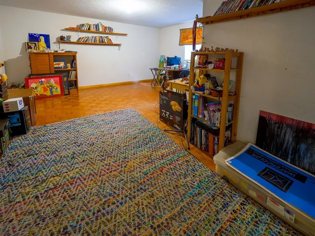 a view of a field with a tree