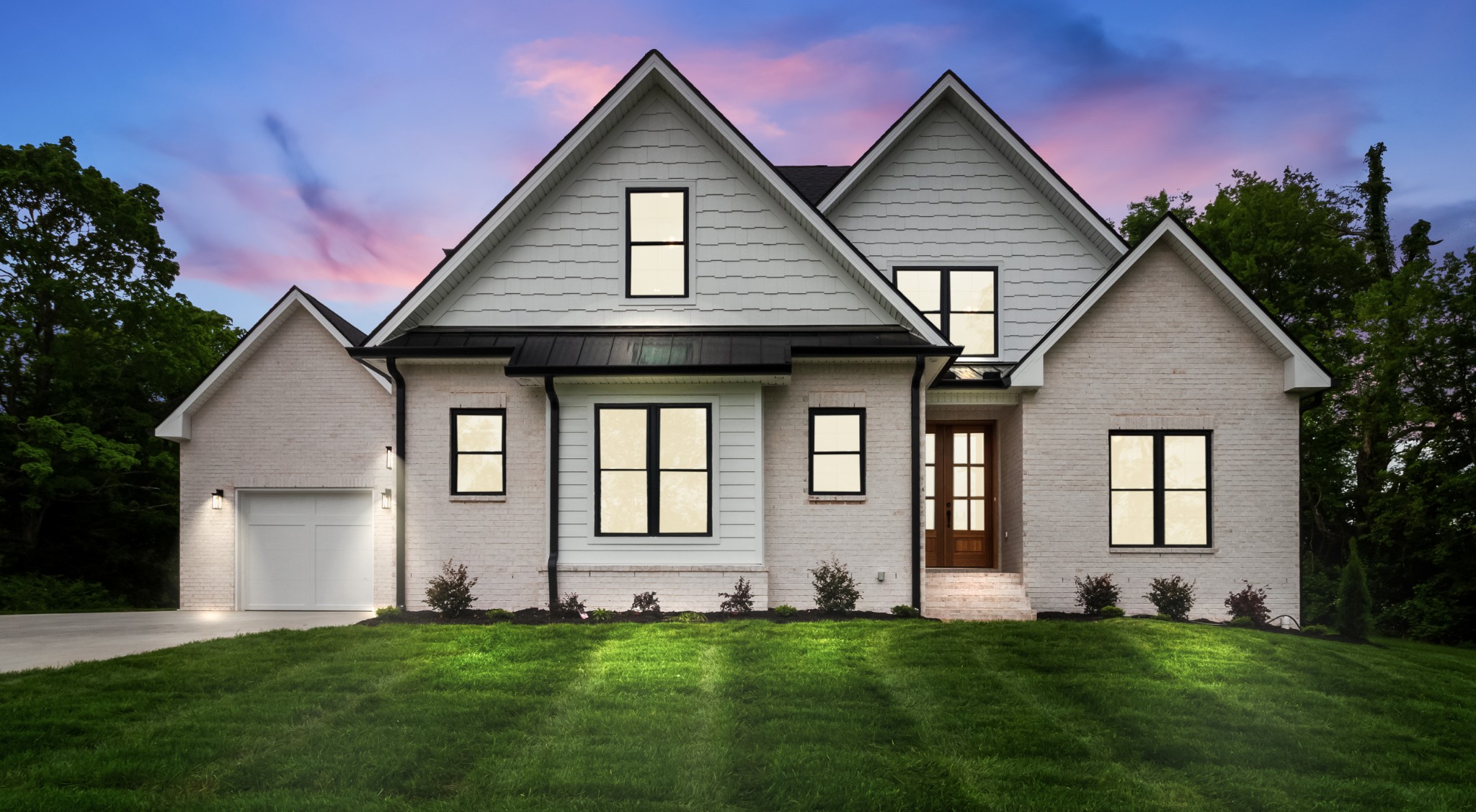 3600 Trough Springs Road Adams, TN 37010 - Photo 1 of 54 a front view of a house with a garden