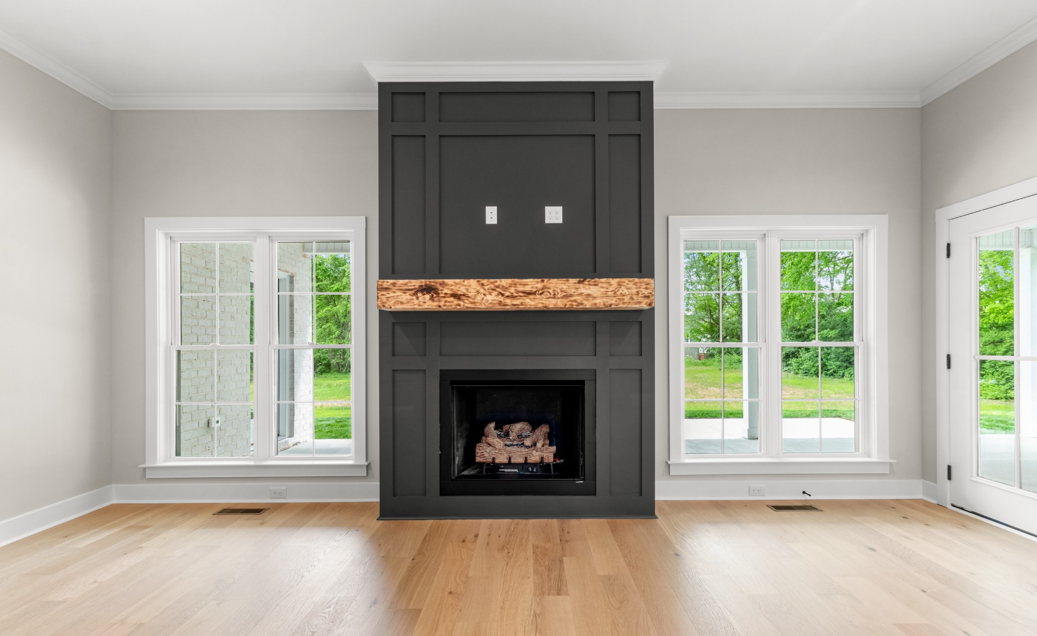 3600 Trough Springs Road Adams, TN 37010 - Photo 12 of 54 a living room with a fireplace and a window