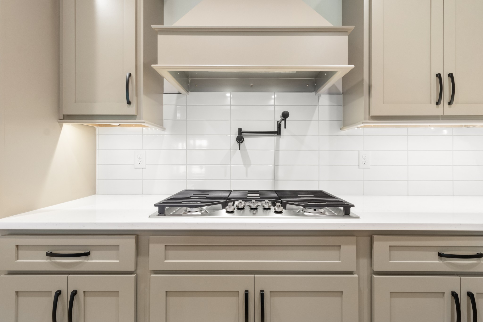 3600 Trough Springs Road Adams, TN 37010 - Photo 17 of 54 a close view of a stove a sink and dishwasher in a kitchen
