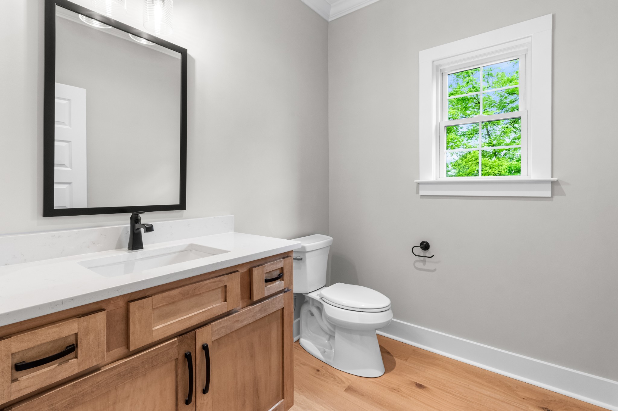 3600 Trough Springs Road Adams, TN 37010 - Photo 21 of 54 a bathroom with a toilet sink and mirror