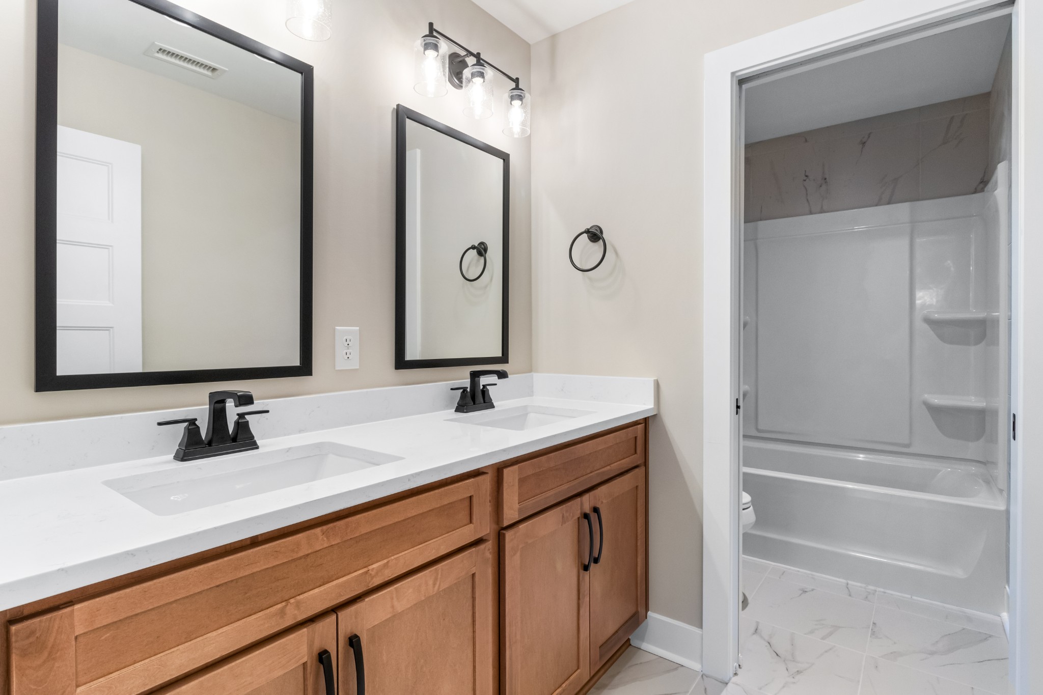3600 Trough Springs Road Adams, TN 37010 - Photo 39 of 54 a bathroom with a sink and a mirror