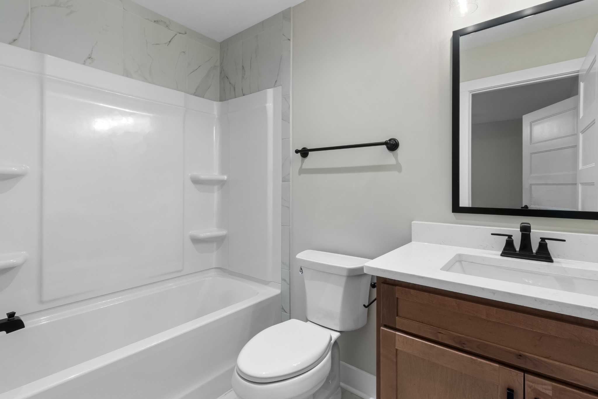 3600 Trough Springs Road Adams, TN 37010 - Photo 45 of 54 a bathroom with a sink a toilet a mirror and shower