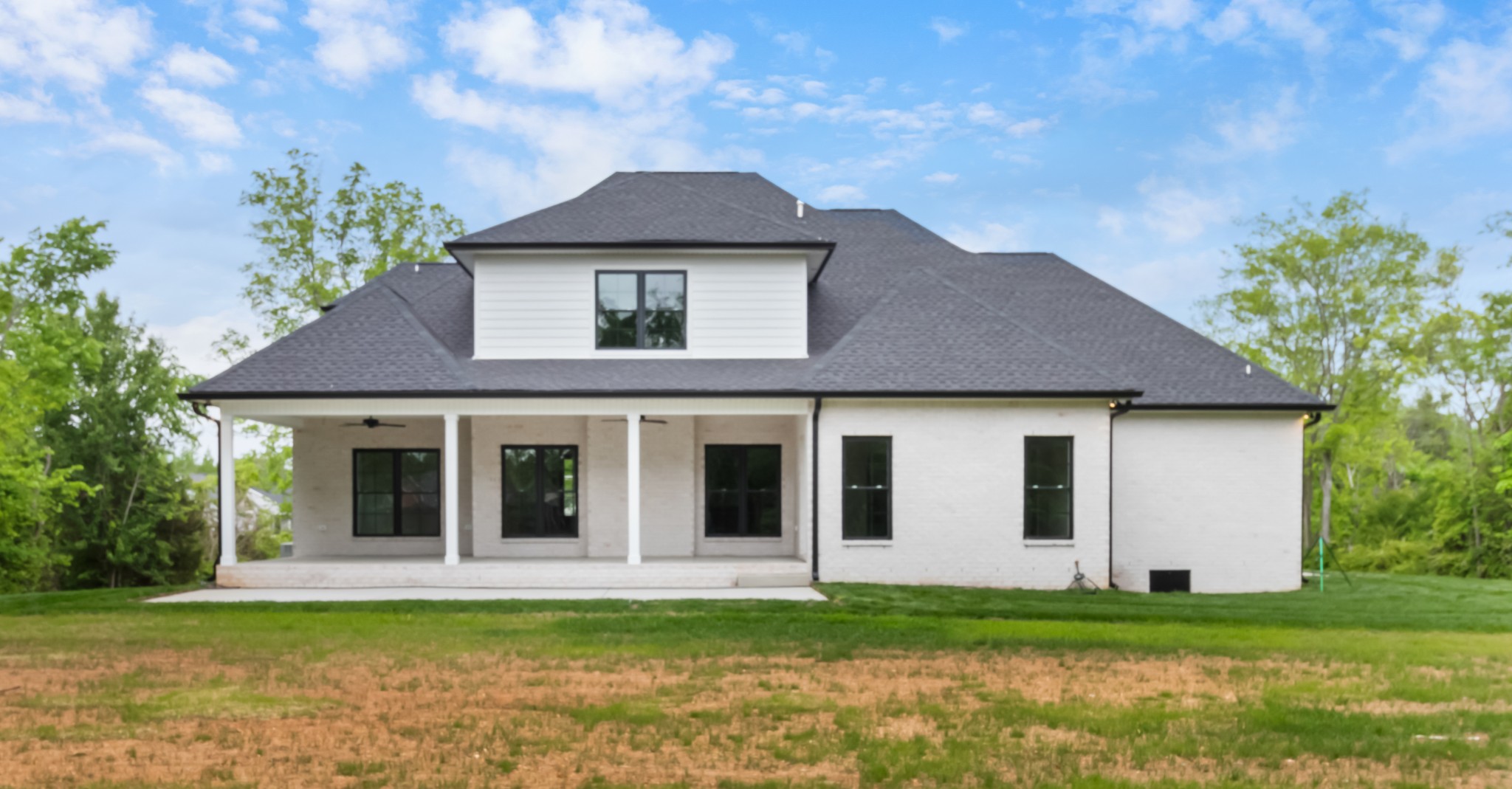 3600 Trough Springs Road Adams, TN 37010 - Photo 51 of 54 a front view of a house with a garden
