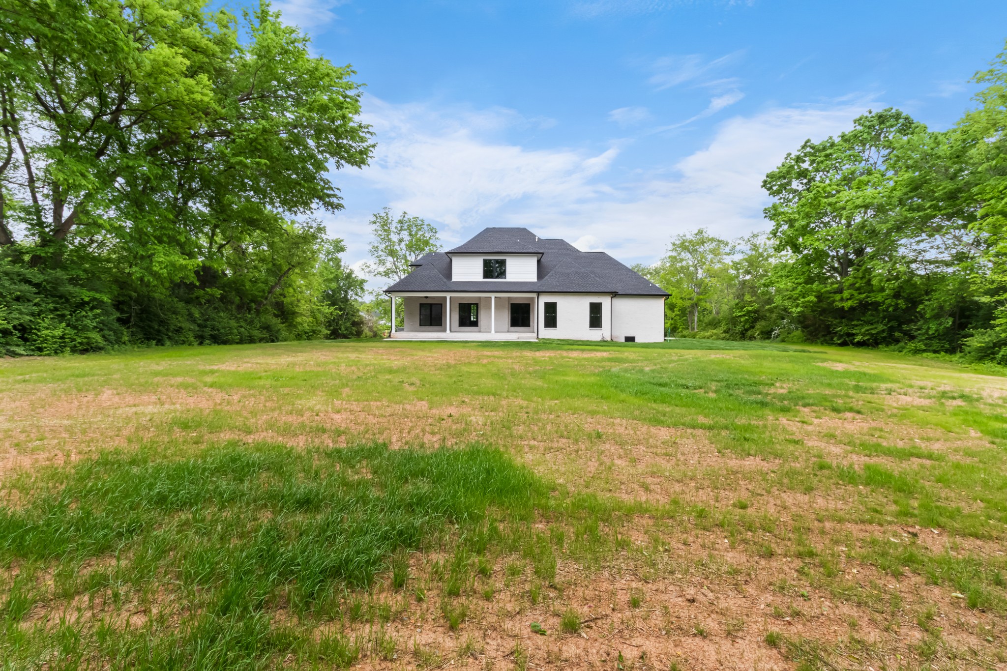 3600 Trough Springs Road Adams, TN 37010 - Photo 52 of 54 a front view of a house with a big yard